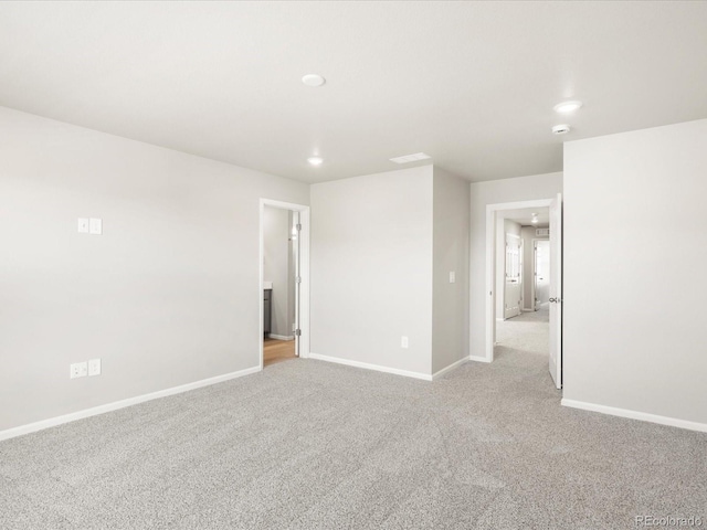 764 N Tempe St, Aurora, CO 80018 - spare room with light carpet and baseboards