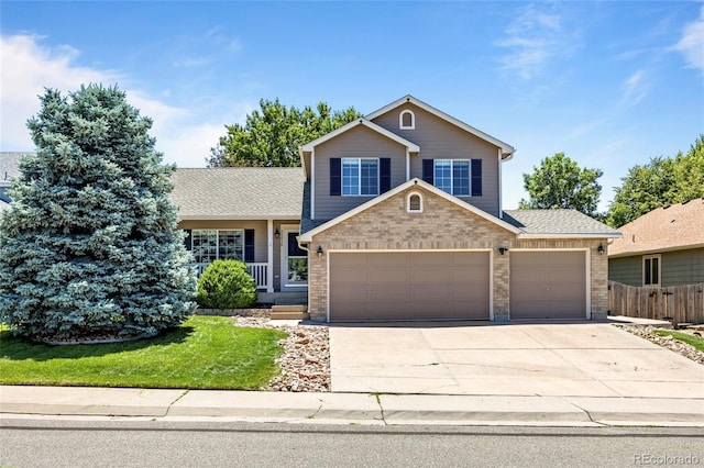 20858 E Progress Ave, Centennial, CO 80015 - view of front of property with concrete driveway, a garage, brick siding, covered porch, and roof with shingles
