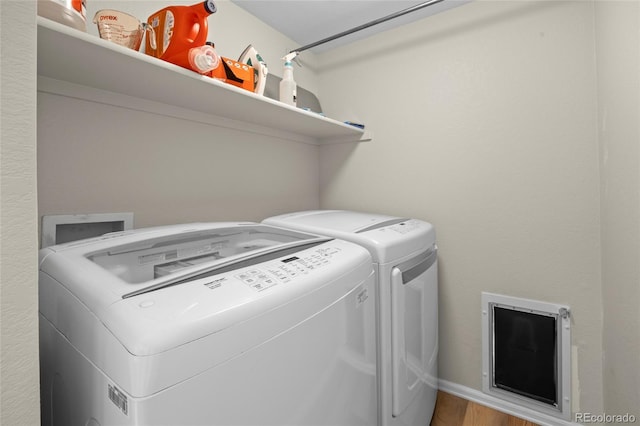 20858 E Progress Ave, Centennial, CO 80015 - laundry area featuring independent washer and dryer and wood finished floors