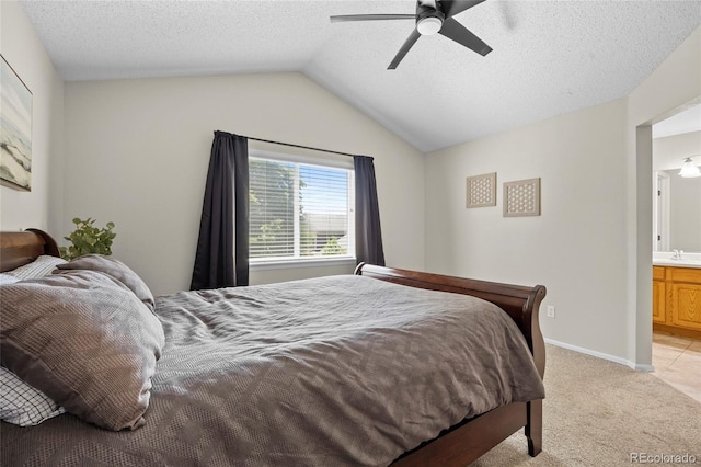 20858 E Progress Ave, Centennial, CO 80015 - bedroom featuring lofted ceiling, light colored carpet, ensuite bathroom, and ceiling fan