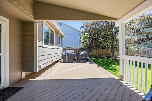 20858 E Progress Ave, Centennial, CO 80015 - wooden terrace featuring grilling area and a fenced backyard
