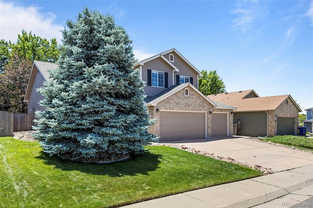 20858 E Progress Ave, Centennial, CO 80015 - view of front facade featuring a garage, brick siding, driveway, and a shingled roof