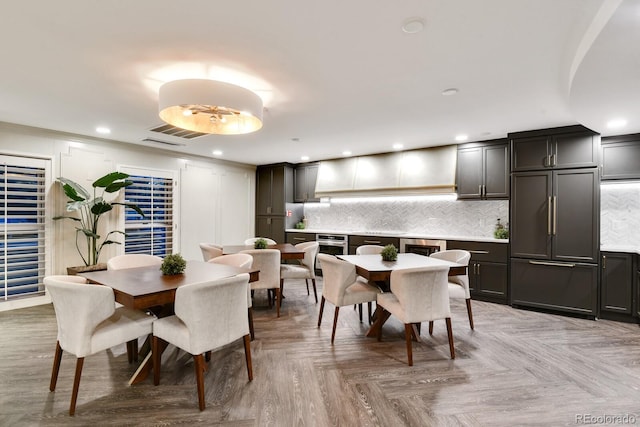 dining area with light parquet floors