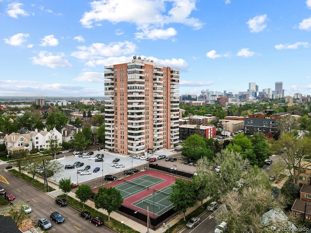 birds eye view of property with a view of city