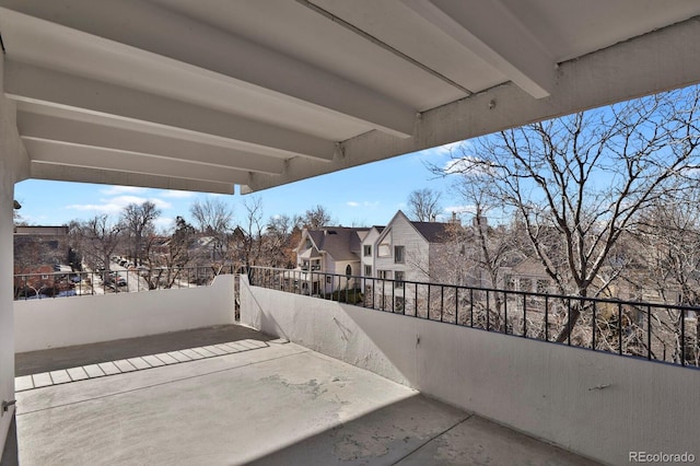 view of patio / terrace featuring a residential view and a balcony