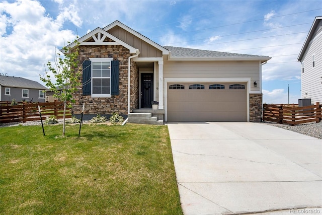 944 Alpine Ridge St, Erie, CO 80516 - view of front of home with stone siding, board and batten siding, a garage, and driveway