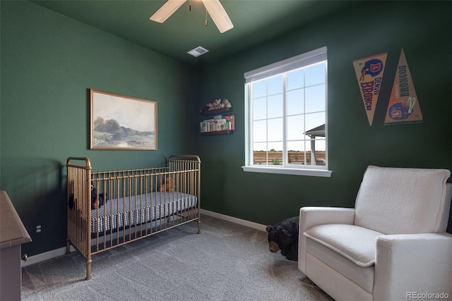 944 Alpine Ridge St, Erie, CO 80516 - carpeted bedroom with a crib, baseboards, and ceiling fan