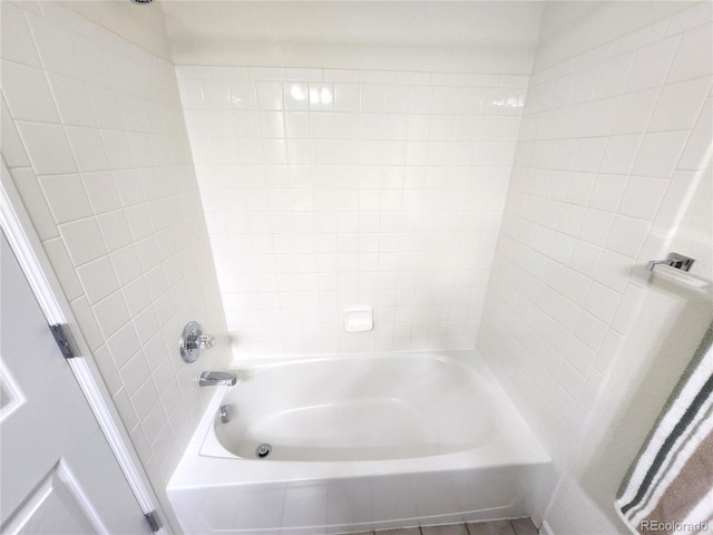 bathroom featuring tub / shower combination