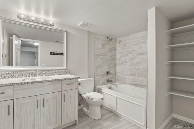 6868 Los Reyes Cir, Colorado Springs, CO 80918 - bathroom with vanity, shower / tub combination, and toilet