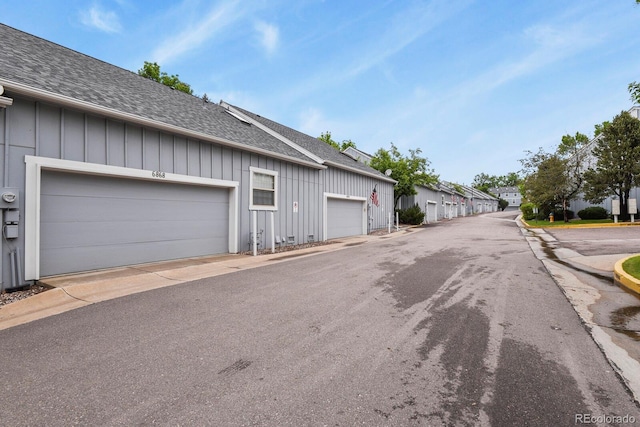 6868 Los Reyes Cir, Colorado Springs, CO 80918 - view of asphalt street featuring curbs