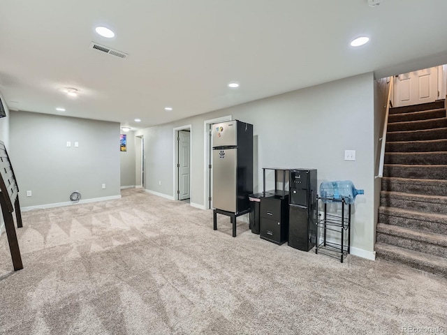 basement with light colored carpet