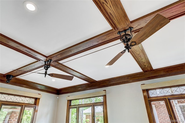 details featuring ceiling fan and beamed ceiling