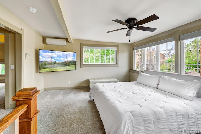 bedroom featuring beamed ceiling, carpet floors, ceiling fan, and multiple windows