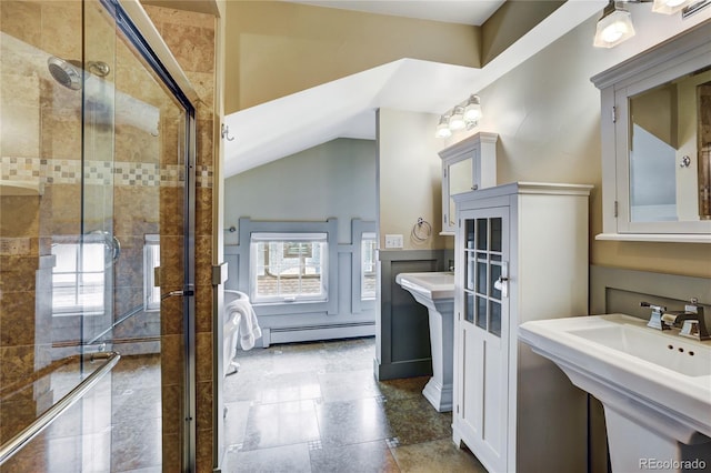 bathroom with a shower with door, vaulted ceiling, a baseboard radiator, and tile floors