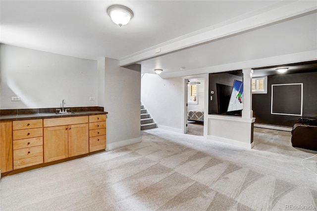 interior space with plenty of natural light, vanity, and a baseboard radiator