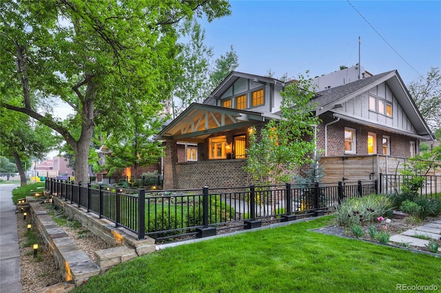 view of front of home with a front lawn