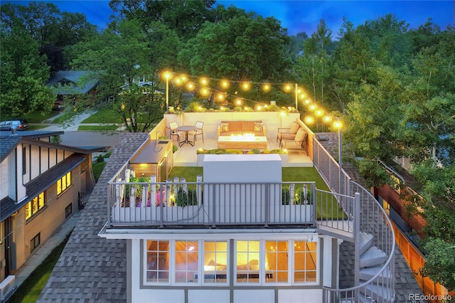 exterior space with a balcony and a patio area