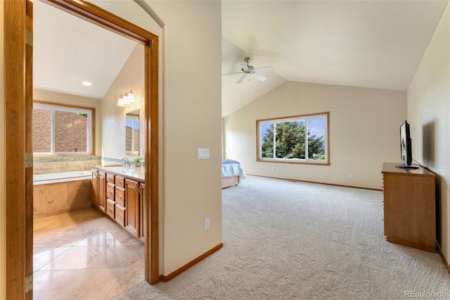6323 S Sicily Way, Aurora, CO 80016 - bonus room featuring vaulted ceiling, a ceiling fan, plenty of natural light, and light colored carpet