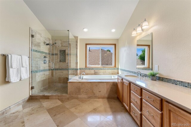 6323 S Sicily Way, Aurora, CO 80016 - bathroom with vaulted ceiling, a bath, vanity, and a stall shower