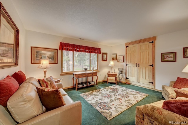 living room with dark colored carpet