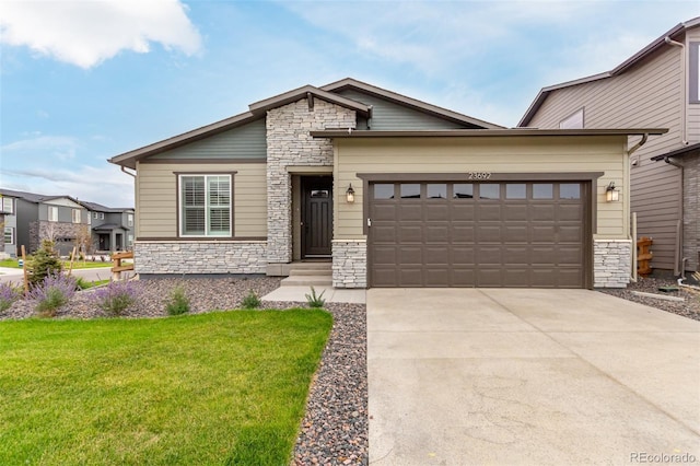 view of front facade featuring a garage and a front lawn