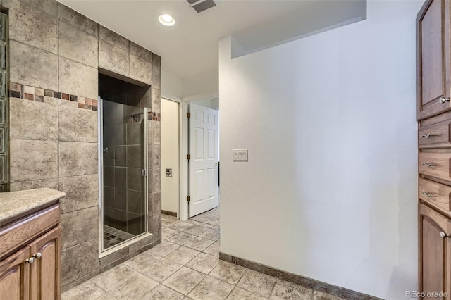 full bath featuring recessed lighting, visible vents, a shower stall, vanity, and baseboards