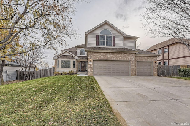 front of property with a garage and a front lawn