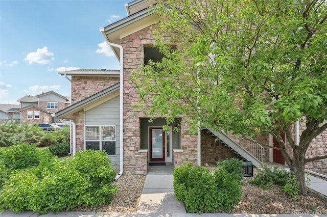 2502 S Bahama Cir Unit B, Aurora, CO 80013 - view of front of home featuring stone siding