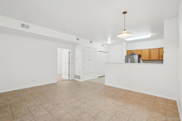 2502 S Bahama Cir Unit B, Aurora, CO 80013 - unfurnished living room with baseboards