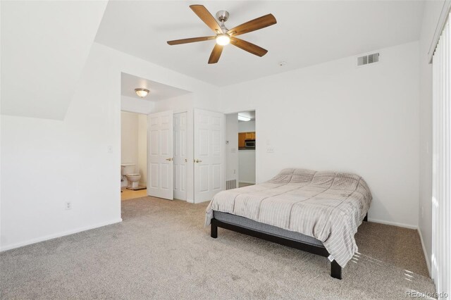 2502 S Bahama Cir Unit B, Aurora, CO 80013 - bedroom with carpet, baseboards, and ensuite bathroom