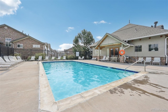 2502 S Bahama Cir Unit B, Aurora, CO 80013 - community pool with a patio and fence