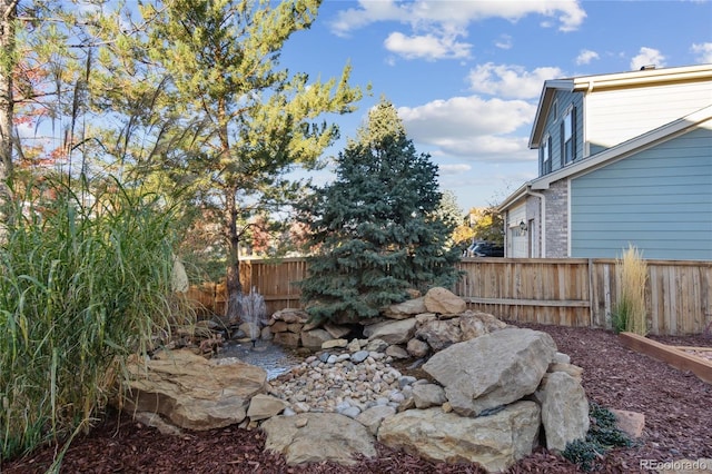 view of yard with fence