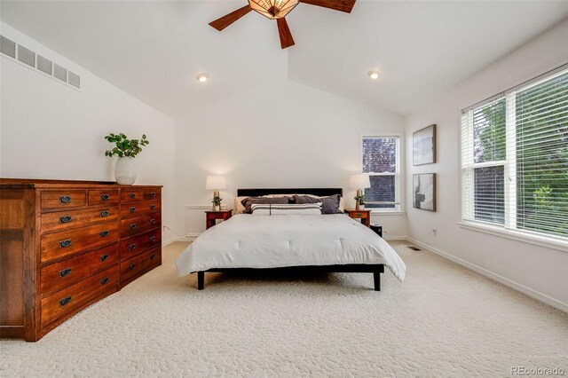 carpeted bedroom featuring vaulted ceiling and ceiling fan