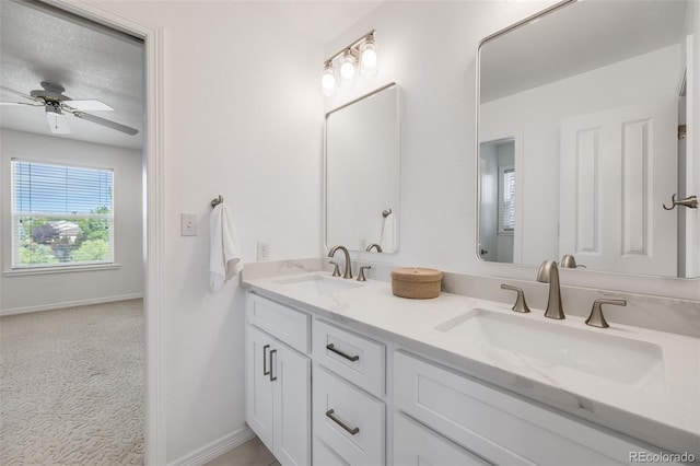 bathroom featuring vanity and ceiling fan