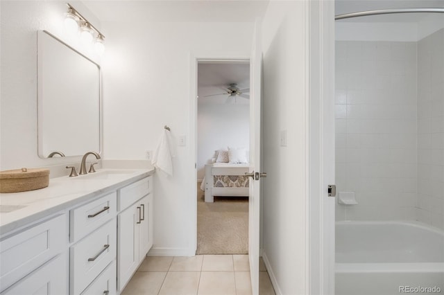 bathroom featuring tile patterned flooring, vanity, and ceiling fan