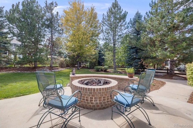 view of patio featuring an outdoor fire pit