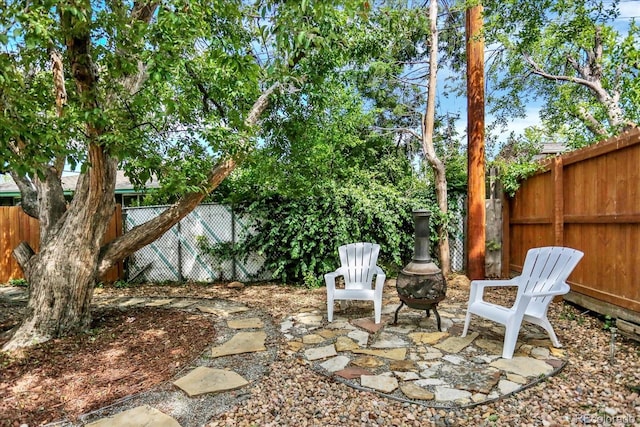 400 S Hoyt St, Lakewood, CO 80226 - fenced backyard featuring a patio