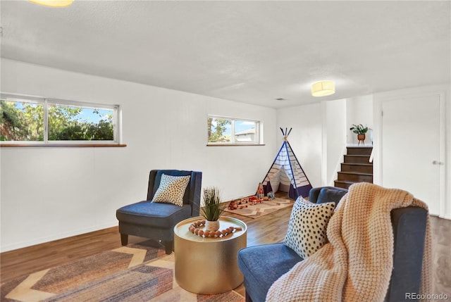 400 S Hoyt St, Lakewood, CO 80226 - sitting room with plenty of natural light, wood finished floors, and baseboards