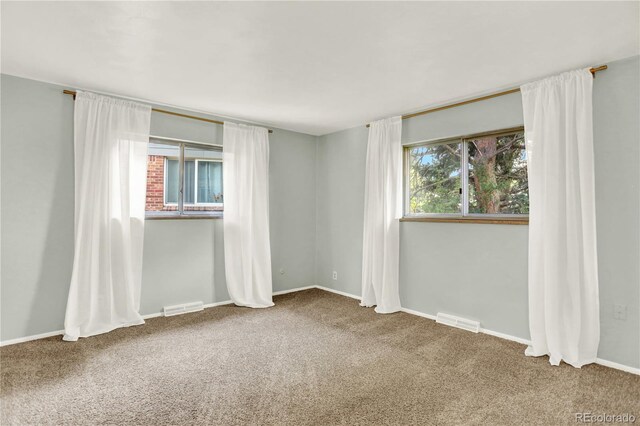 400 S Hoyt St, Lakewood, CO 80226 - carpeted empty room with baseboards