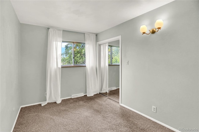 400 S Hoyt St, Lakewood, CO 80226 - empty room with carpet flooring and baseboards