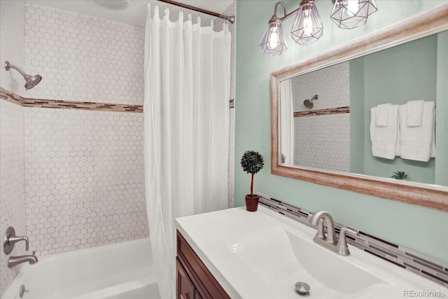 400 S Hoyt St, Lakewood, CO 80226 - full bath featuring shower / bath combo with shower curtain and vanity