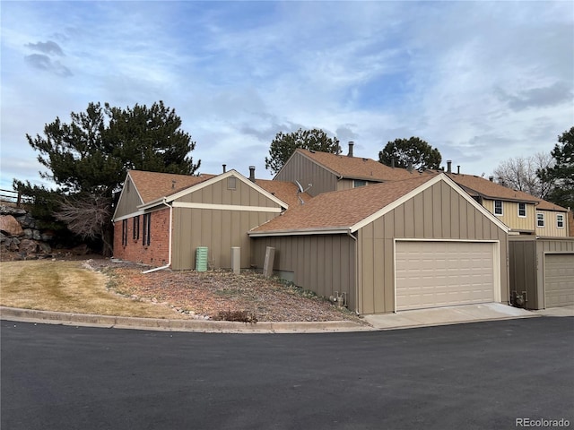 view of front of property with a garage