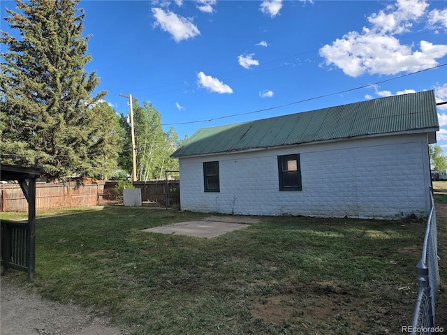 104 Joe S Chavez Dr, La Jara, CO 81140 - view of side of property featuring a metal roof