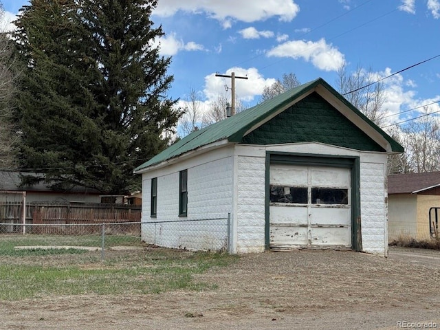 104 Joe S Chavez Dr, La Jara, CO 81140 - garage with dirt driveway
