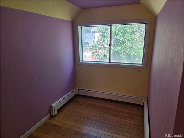 104 Joe S Chavez Dr, La Jara, CO 81140 - unfurnished room with wood finished floors and vaulted ceiling