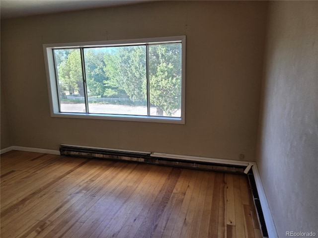 104 Joe S Chavez Dr, La Jara, CO 81140 - empty room with plenty of natural light and hardwood / wood-style floors