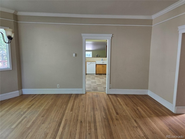 104 Joe S Chavez Dr, La Jara, CO 81140 - empty room with wood finished floors and ornamental molding