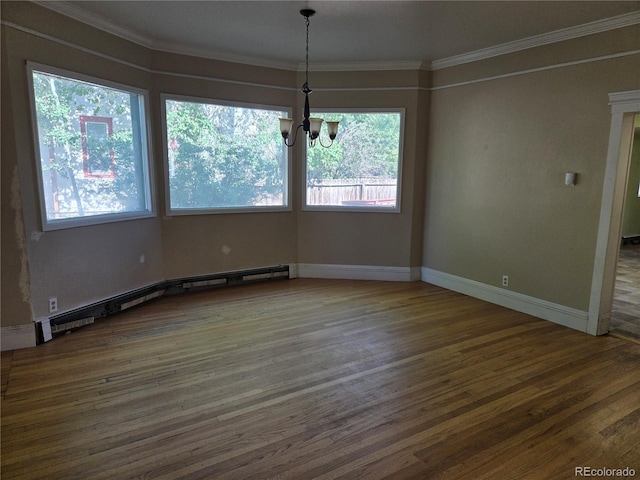 104 Joe S Chavez Dr, La Jara, CO 81140 - unfurnished dining area featuring a chandelier, wood finished floors, crown molding, and baseboard heating
