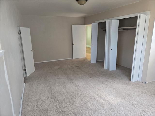 104 Joe S Chavez Dr, La Jara, CO 81140 - unfurnished bedroom with carpet floors and multiple closets