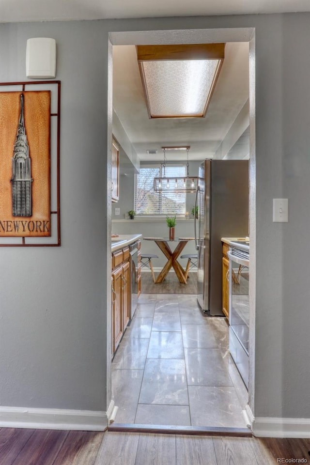 hallway featuring light wood-type flooring